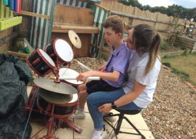 Harrison attends Kids Camp Holiday Club and enjoys playing the drums.