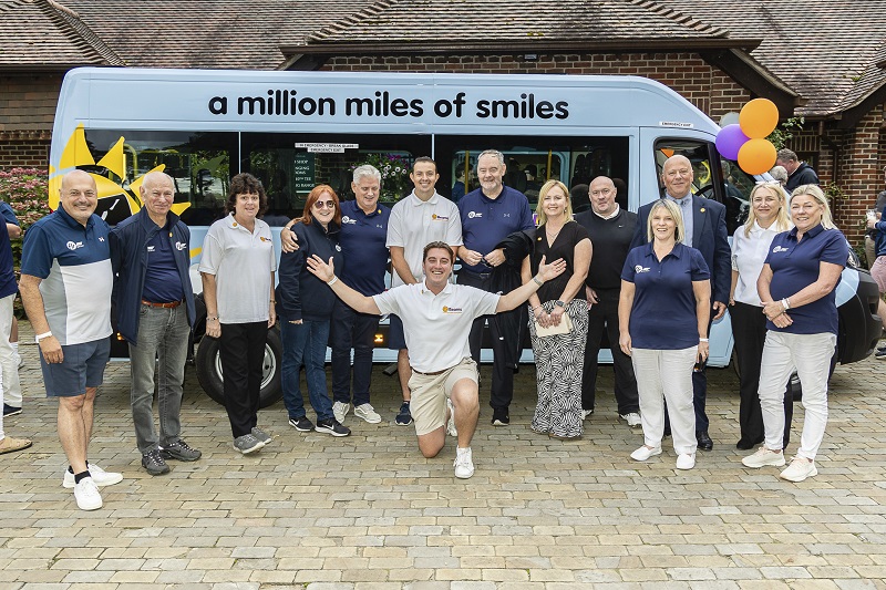 Charity Golfers donate new Sunshine Coach to local charity